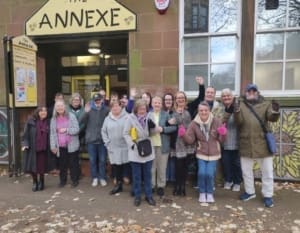 Members of the local community outside The Annexe, located in Partick